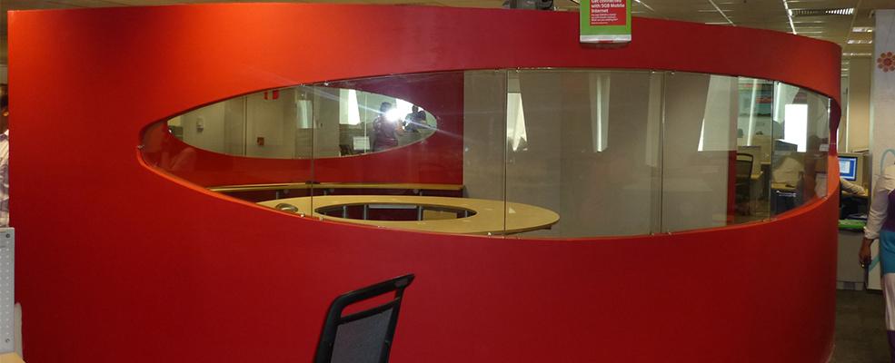 Nicely designed offices counter with wooden accents that add a nature look and feel to the workplace